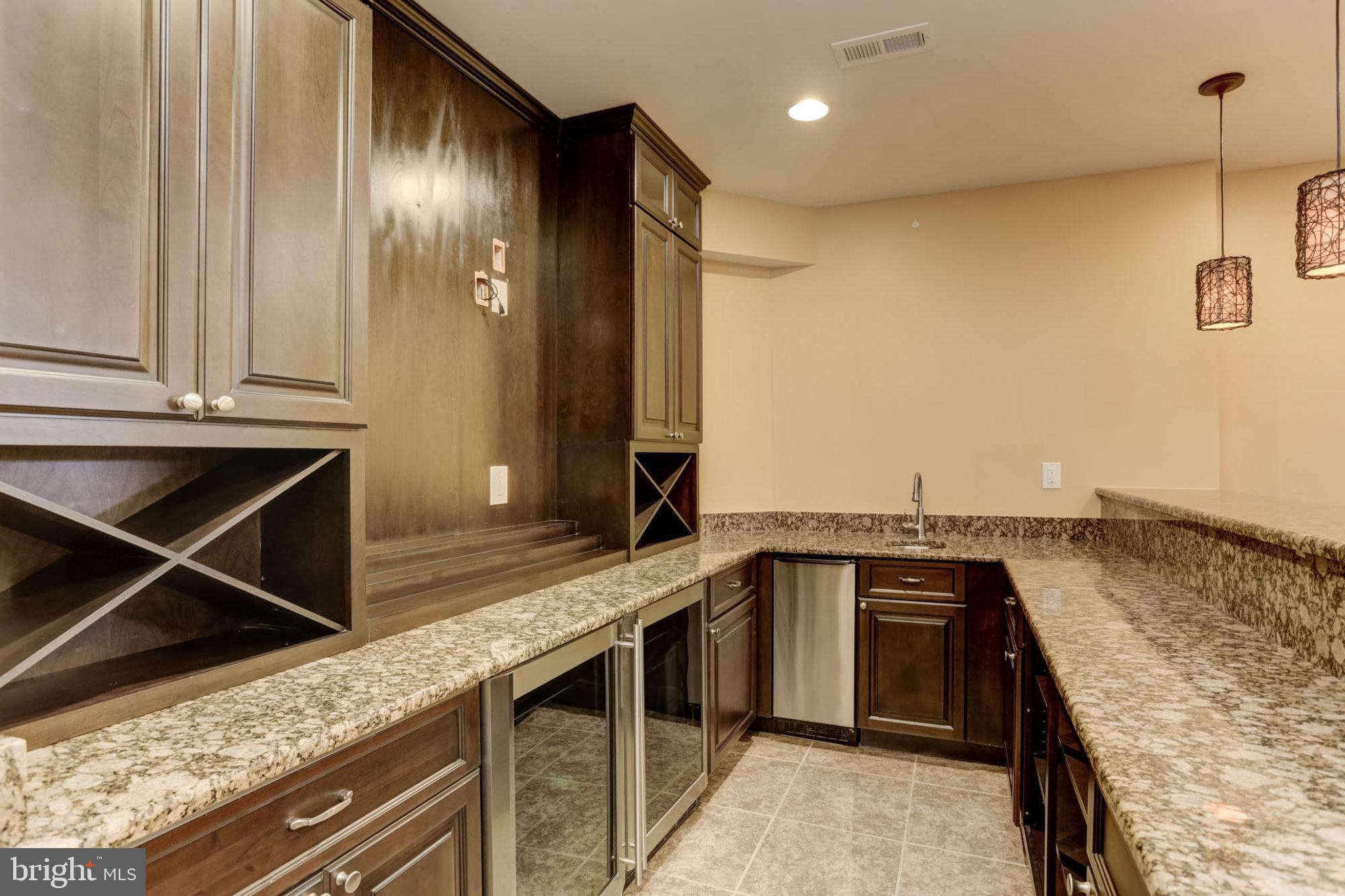 2014 Drovers Lane Cooksville, MD 21723 - Photo 42 of 55 Granite topped, 2 wine fridges, custom built-ins