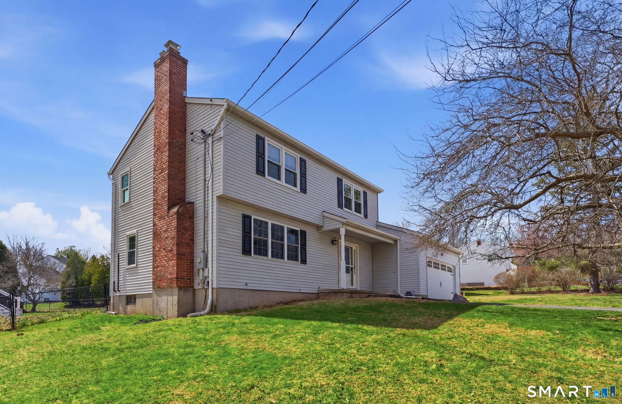 148 Hart Street Southington, CT 06489 - Photo 1 of 1 a view of a house with a yard