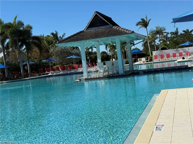 a view of a yard with palm trees