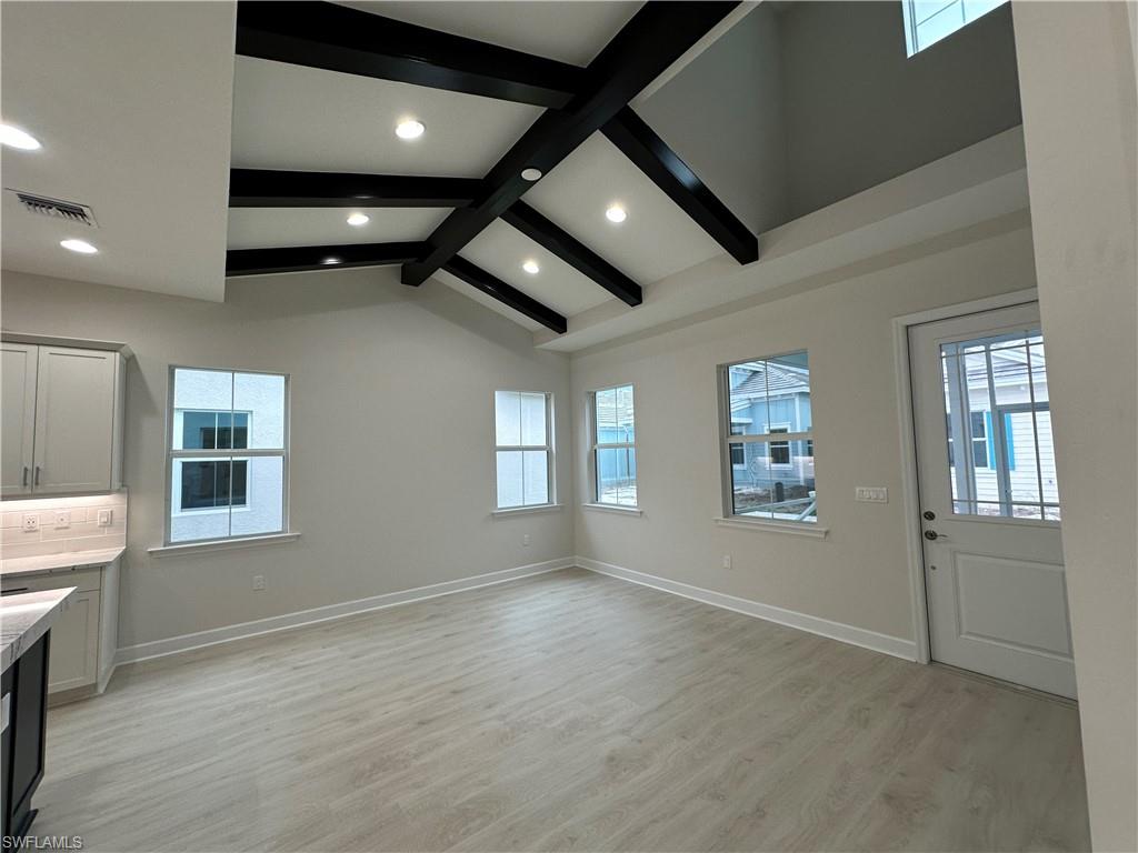 7255 Saona Court Naples, FL 34113 - Photo 3 of 28 a view of an empty room with a window