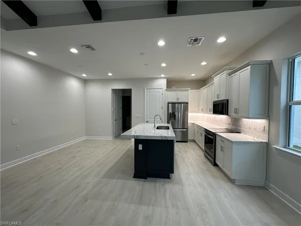a view of a livingroom with a hallway