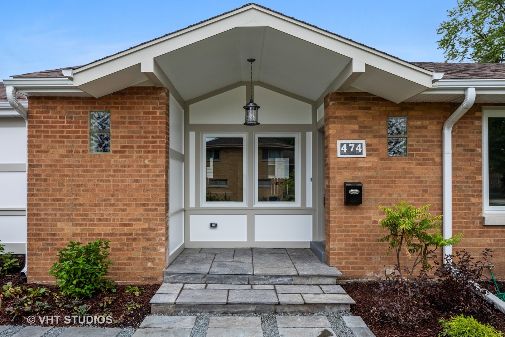 474 Uvedale Court Riverside, IL 60546 - Photo 2 of 23 a front view of a house with a yard