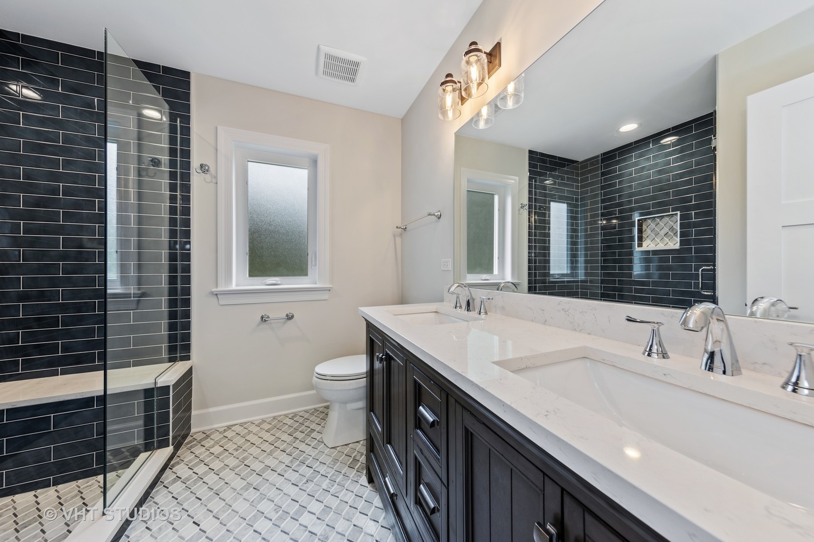 474 Uvedale Court Riverside, IL 60546 - Photo 13 of 23 a bathroom with a double vanity sink and a mirror