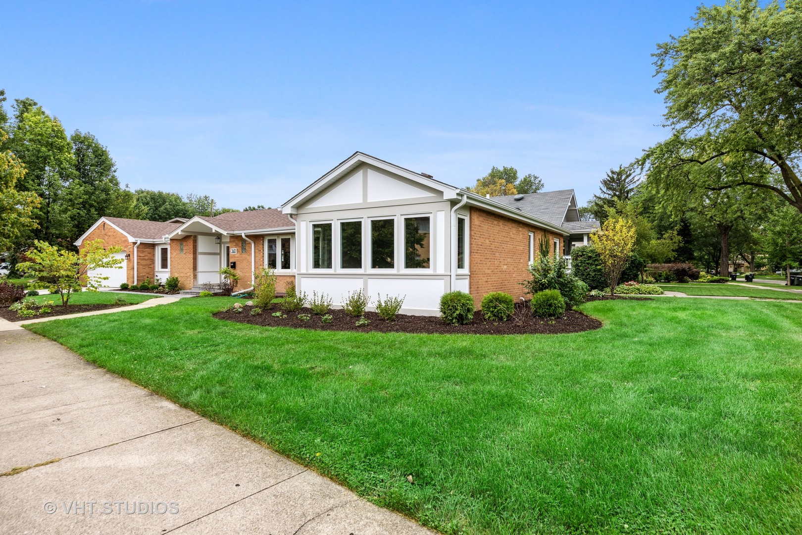 474 Uvedale Court Riverside, IL 60546 - Photo 19 of 23 a front view of a house with yard and green space