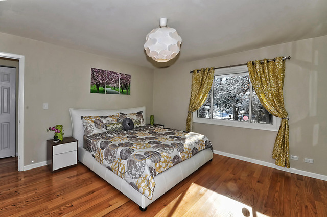 605 West Gilbert Road Palatine, IL 60067 - Photo 12 of 25 a bedroom with a bed and a window