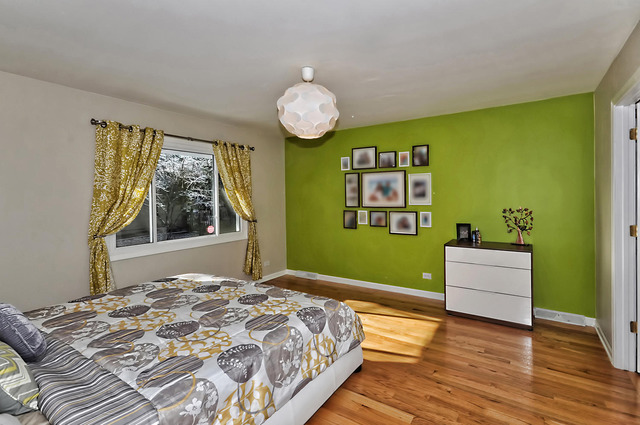 605 West Gilbert Road Palatine, IL 60067 - Photo 13 of 25 a bedroom with a bed and a window