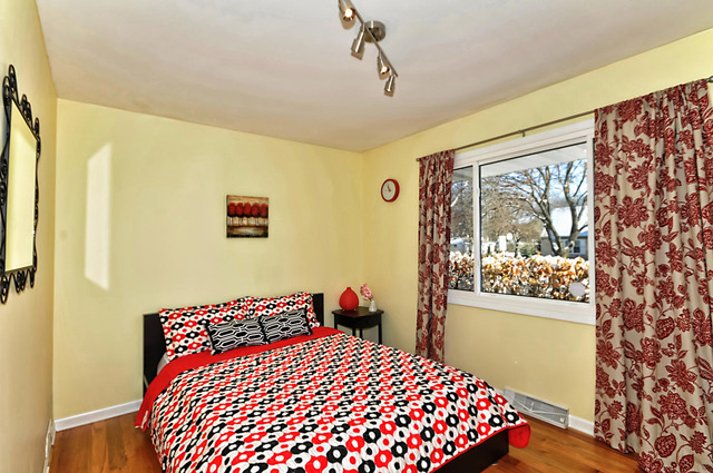 605 West Gilbert Road Palatine, IL 60067 - Photo 15 of 25 a bedroom with a bed and wooden floor