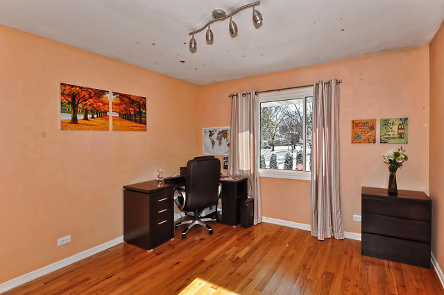 605 West Gilbert Road Palatine, IL 60067 - Photo 16 of 25 a workspace with furniture hardwood and a window