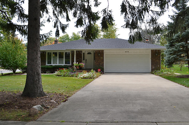 605 West Gilbert Road Palatine, IL 60067 - Photo 2 of 25 a front view of house with a garden