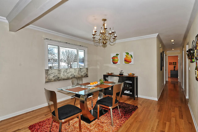 605 West Gilbert Road Palatine, IL 60067 - Photo 7 of 25 a view of a dining room with furniture and wooden floor