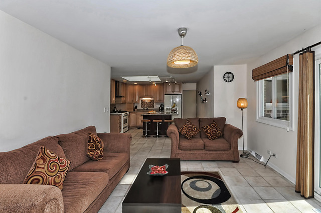 605 West Gilbert Road Palatine, IL 60067 - Photo 10 of 25 a living room with furniture and a wooden floor