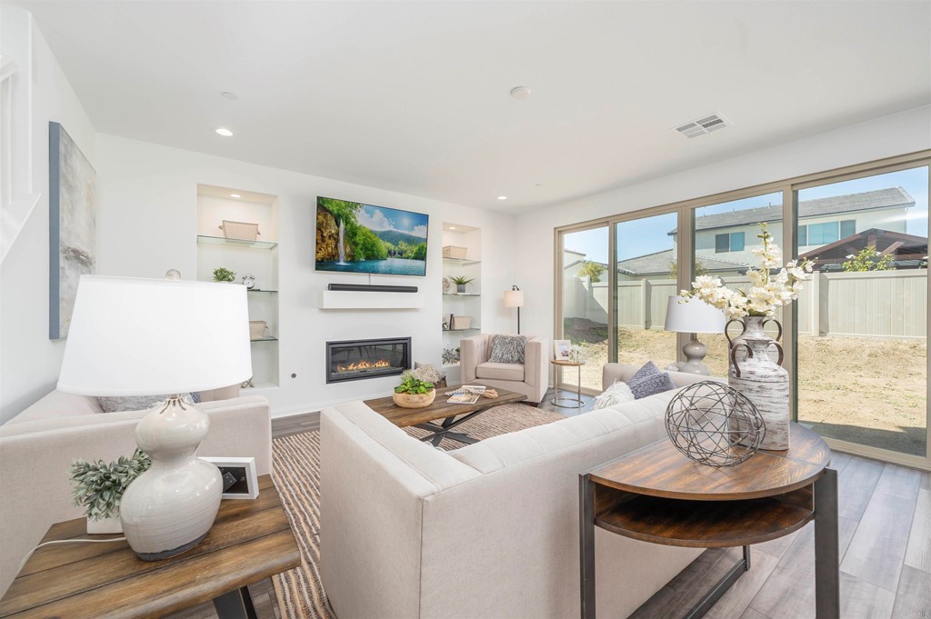 33288 Skyview Road Winchester, CA 92596 - Photo 15 of 51 a living room with fireplace furniture and a table