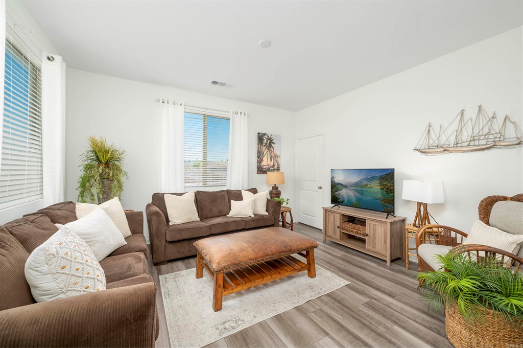 33288 Skyview Road Winchester, CA 92596 - Photo 27 of 51 a living room with furniture and a flat screen tv