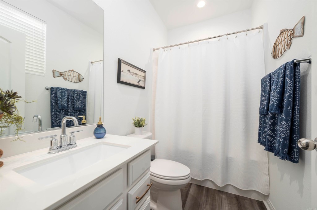33288 Skyview Road Winchester, CA 92596 - Photo 30 of 51 a bathroom with a sink toilet and shower