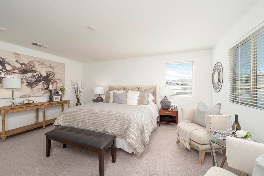 33288 Skyview Road Winchester, CA 92596 - Photo 32 of 51 a bedroom with a bed and a couch