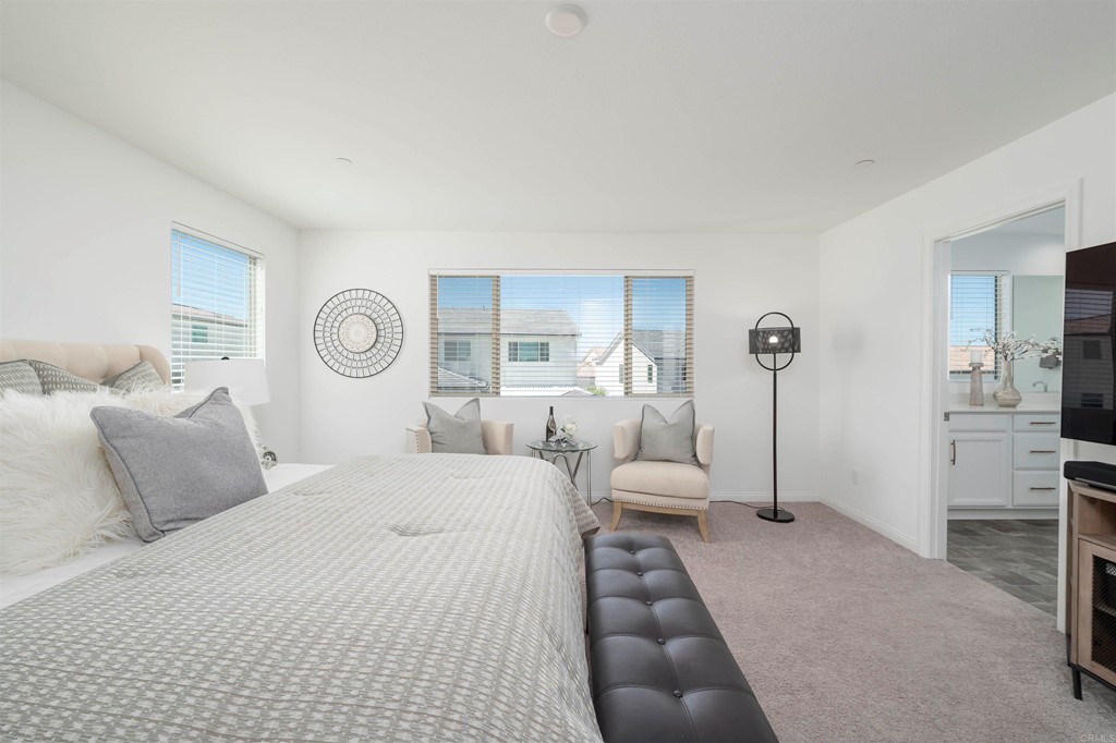 33288 Skyview Road Winchester, CA 92596 - Photo 33 of 51 a bedroom with a bed and a couch