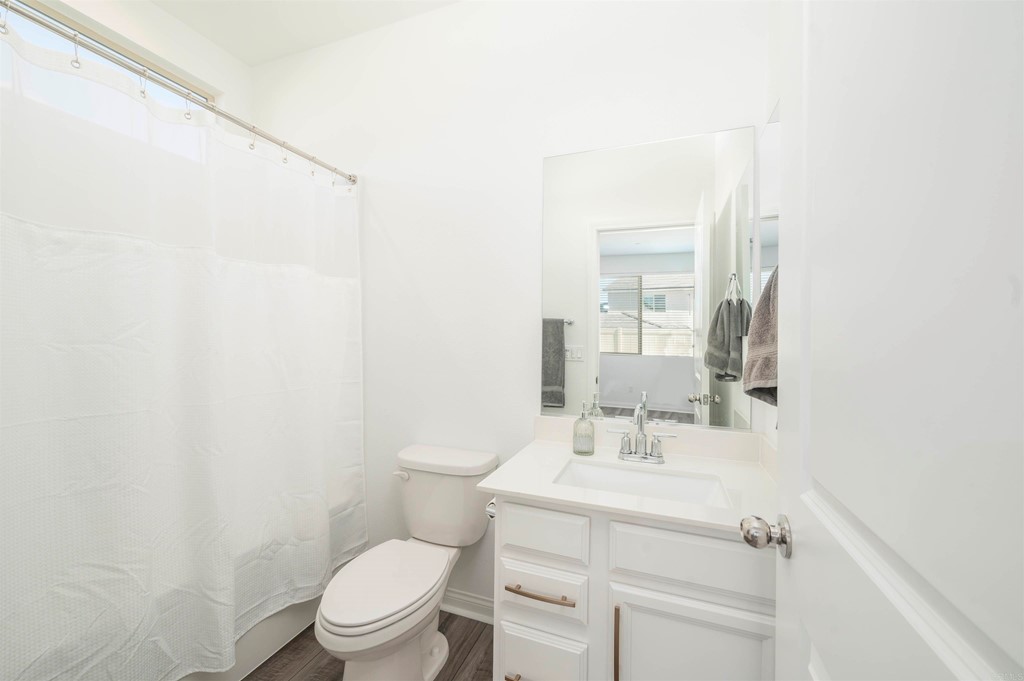 33288 Skyview Road Winchester, CA 92596 - Photo 38 of 51 a bathroom with a sink a toilet and a mirror