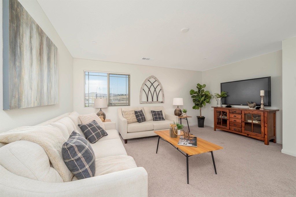 33288 Skyview Road Winchester, CA 92596 - Photo 39 of 51 a living room with furniture and a flat screen tv