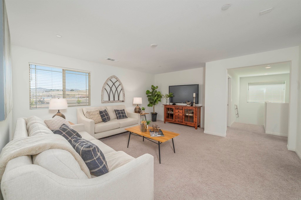 33288 Skyview Road Winchester, CA 92596 - Photo 41 of 51 a living room with furniture and a large window