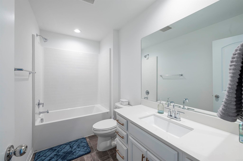 33288 Skyview Road Winchester, CA 92596 - Photo 43 of 51 a bathroom with a sink toilet vanity and shower