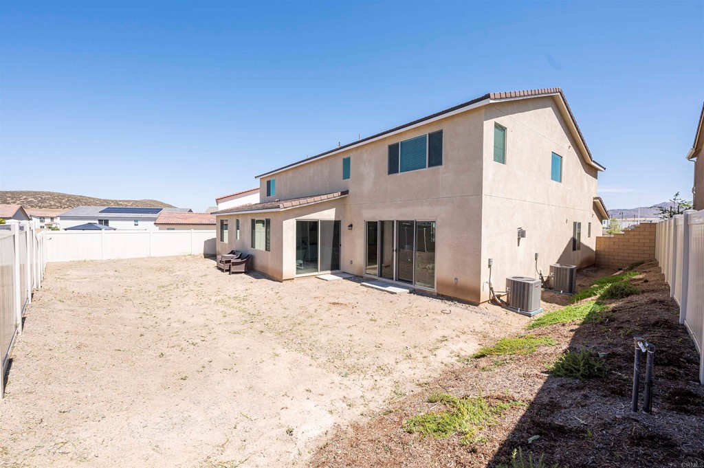 33288 Skyview Road Winchester, CA 92596 - Photo 48 of 51 a front view of a house with a yard