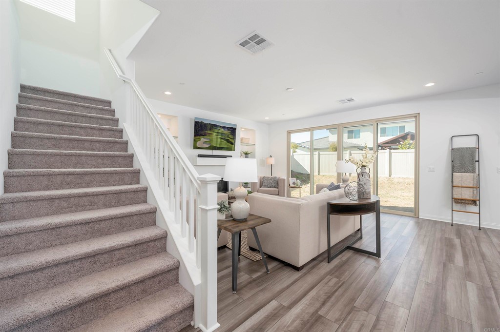 33288 Skyview Road Winchester, CA 92596 - Photo 7 of 51 a living room with furniture and a table