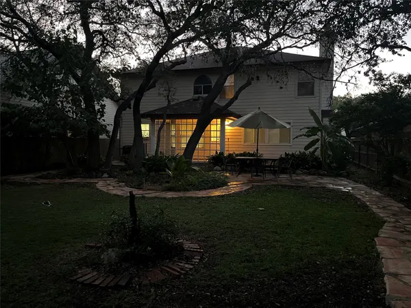 a view of backyard with green space