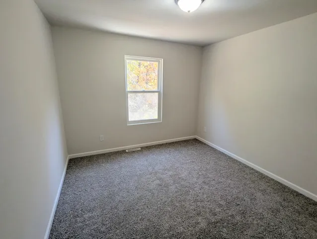 an empty room with an entryway