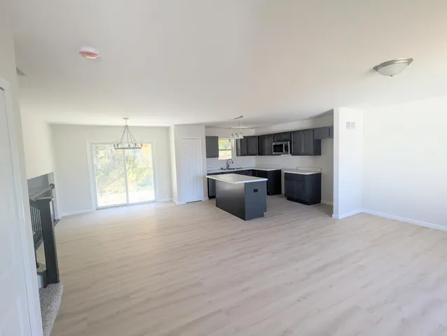 a large room with windows and yard