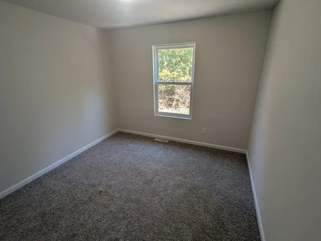 an empty room with closet