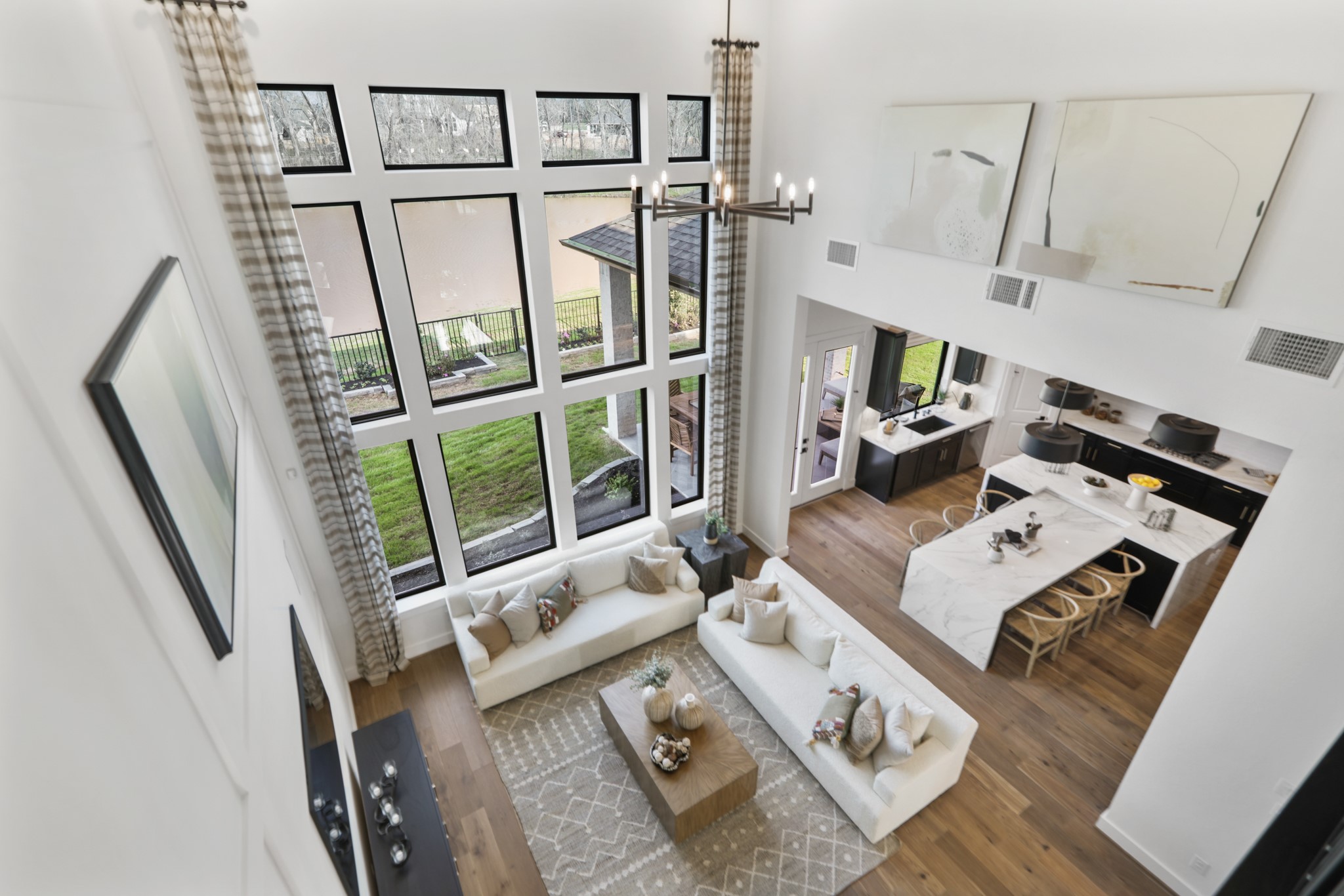 8607 Blue Grotto Lane Manvel, TX 77578 - Photo 11 of 37 a living room with furniture and a floor to ceiling window