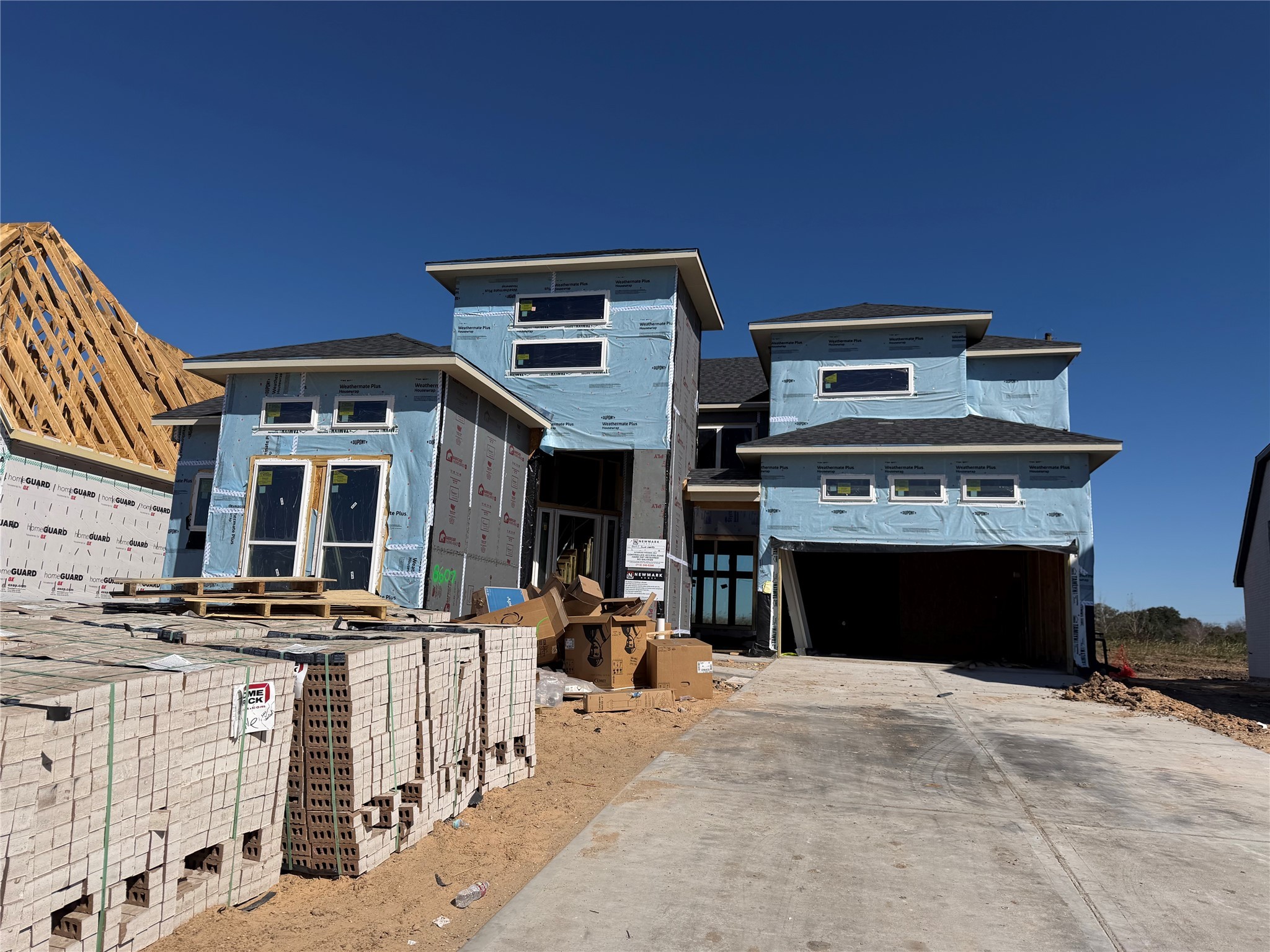 8607 Blue Grotto Lane Manvel, TX 77578 - Photo 3 of 37 a living room with furniture a fireplace and a fireplace