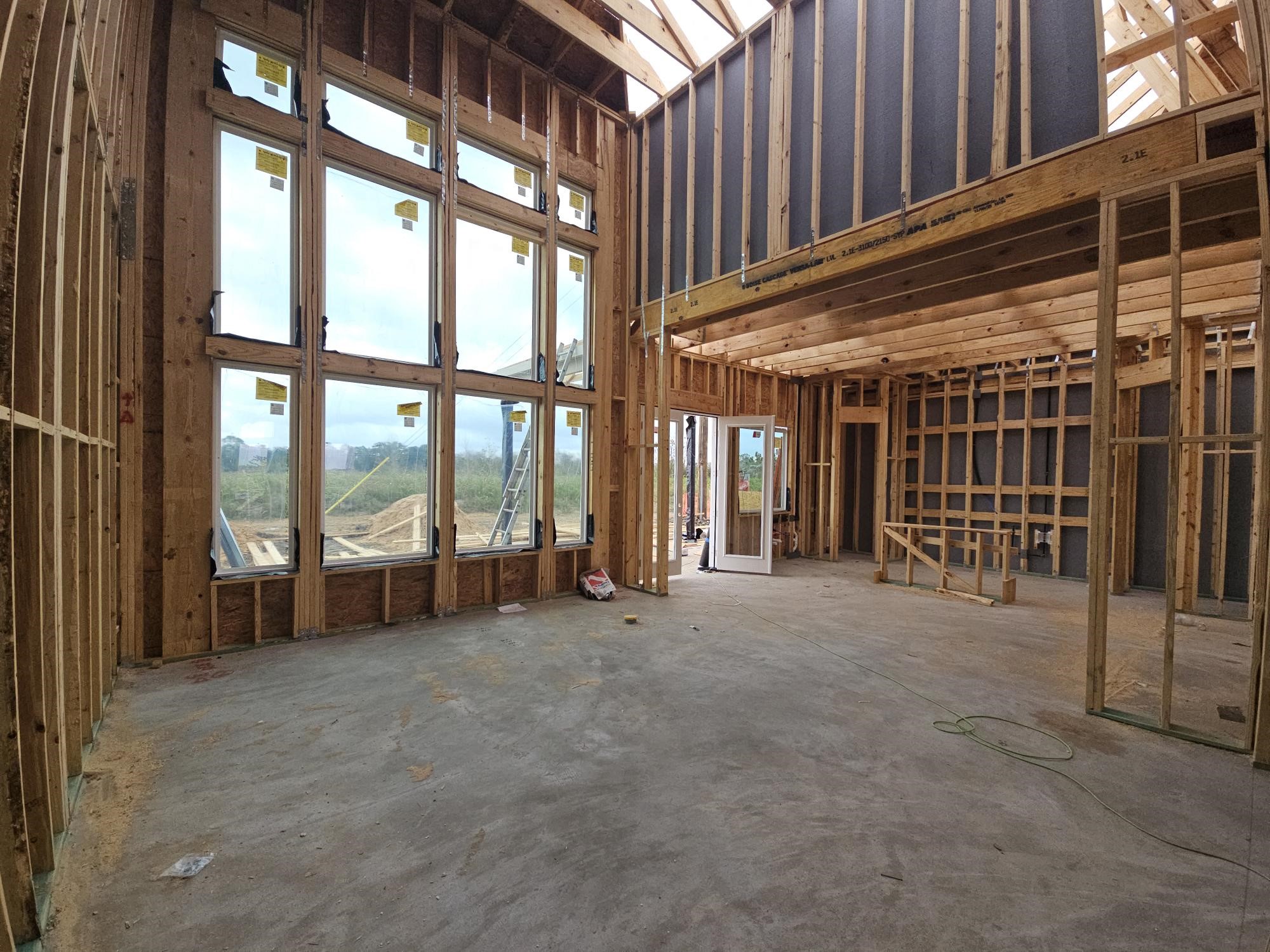8607 Blue Grotto Lane Manvel, TX 77578 - Photo 4 of 37 a view of an empty room with a balcony