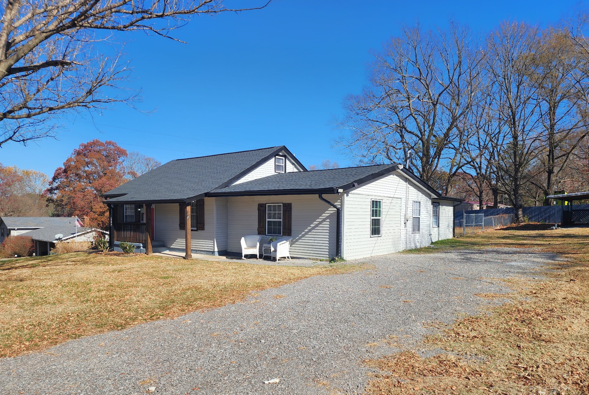 3618 Academy Road Portland, TN 37148 - Photo 2 of 22 a view of a house with a yard covered in snow