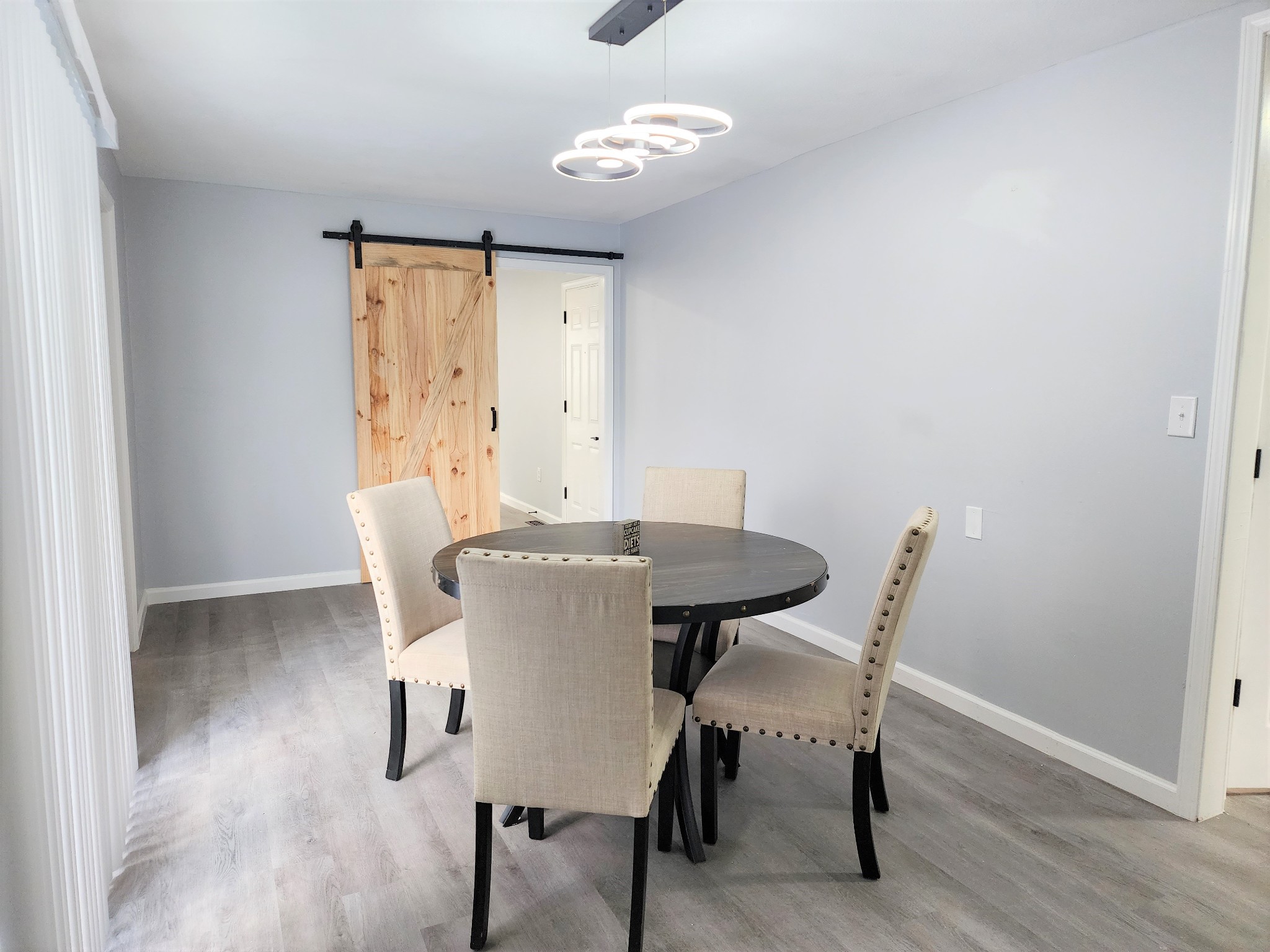 3618 Academy Road Portland, TN 37148 - Photo 8 of 22 a view of a dining room with furniture and wooden floor