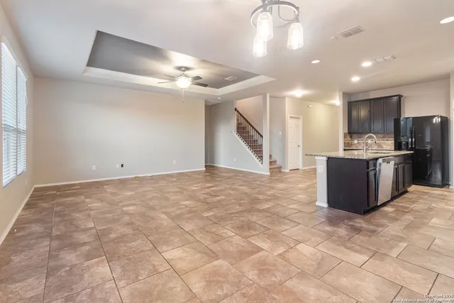 a view of a kitchen with a sink