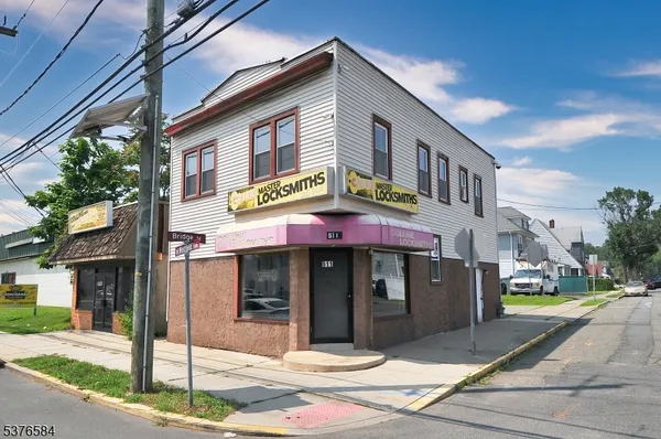a front view of a building with street view