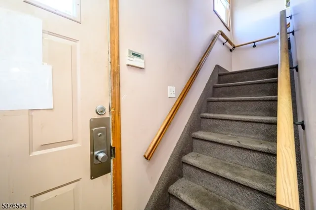 a view of a room with a large window