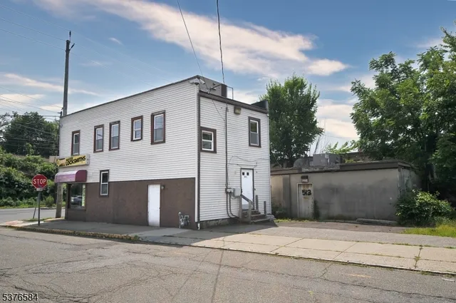 a front view of a building with street