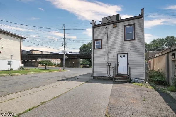 a front view of a house with garage