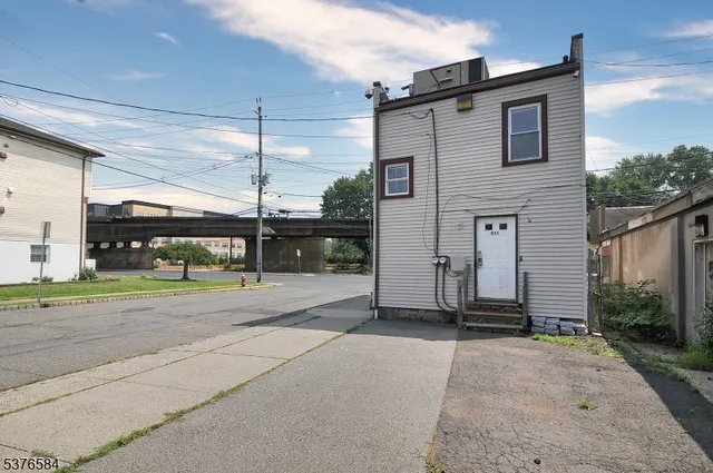a front view of a house with garage