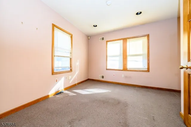 a view of an empty room with window