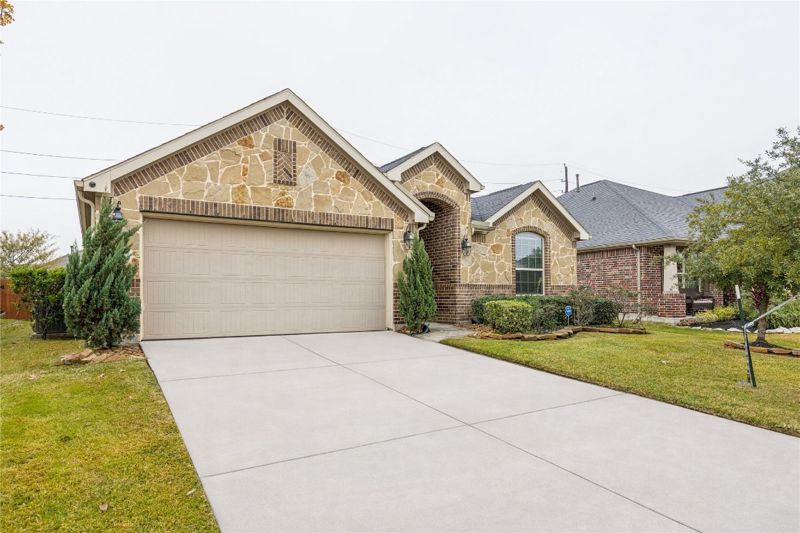 3876 Oakmist Bend Lane Spring, TX 77386 - Photo 2 of 41 a view of house and outdoor space