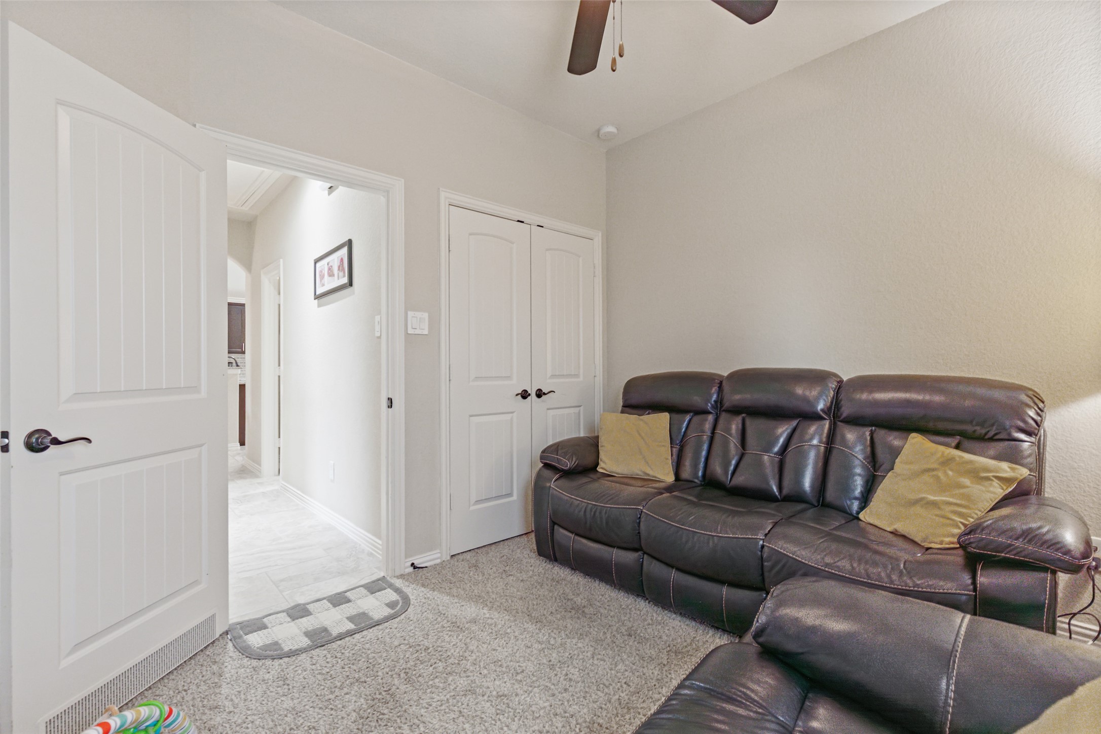 3876 Oakmist Bend Lane Spring, TX 77386 - Photo 22 of 41 a living room with furniture and a rug