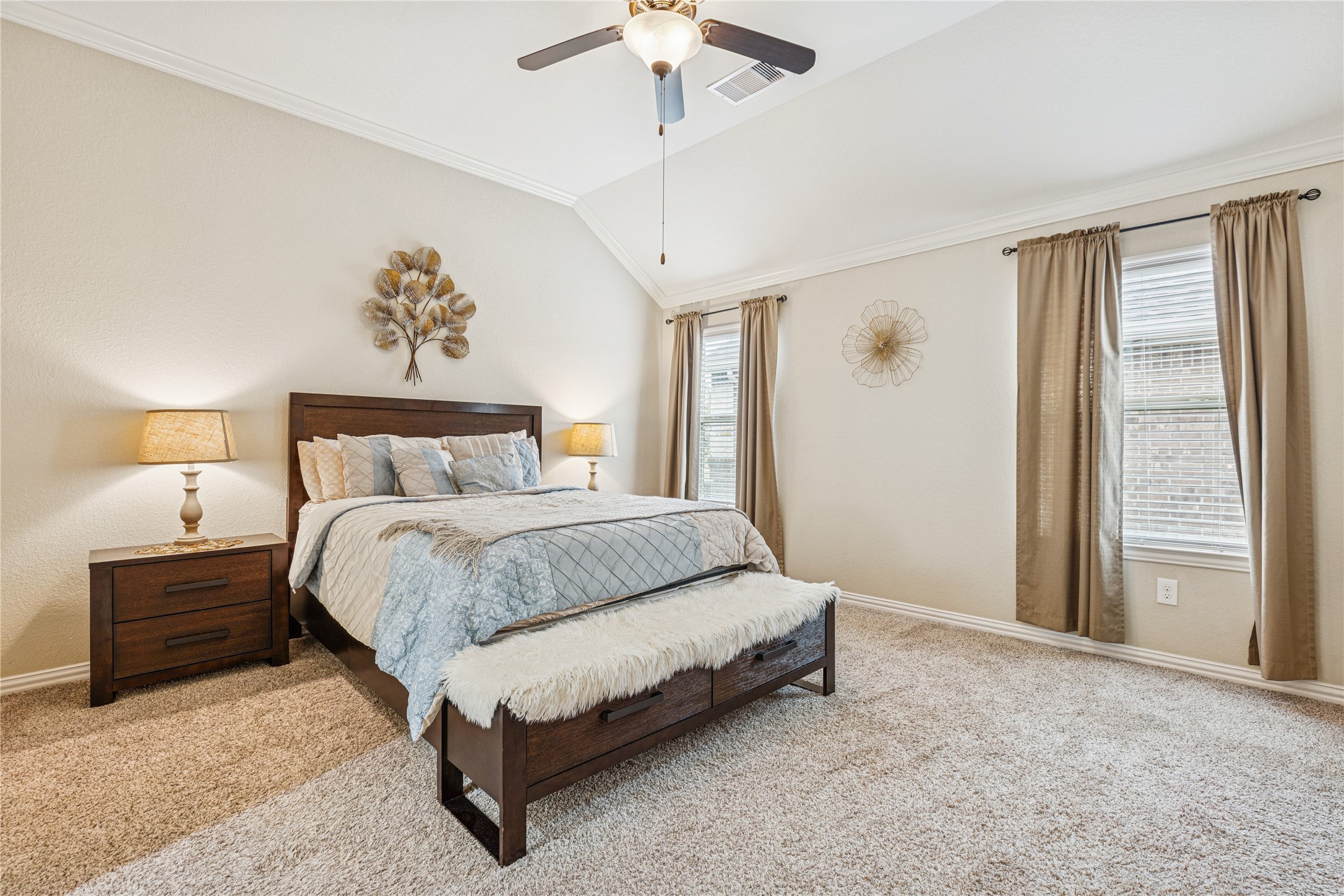 3876 Oakmist Bend Lane Spring, TX 77386 - Photo 24 of 41 a spacious bedroom with a bed and a chandelier