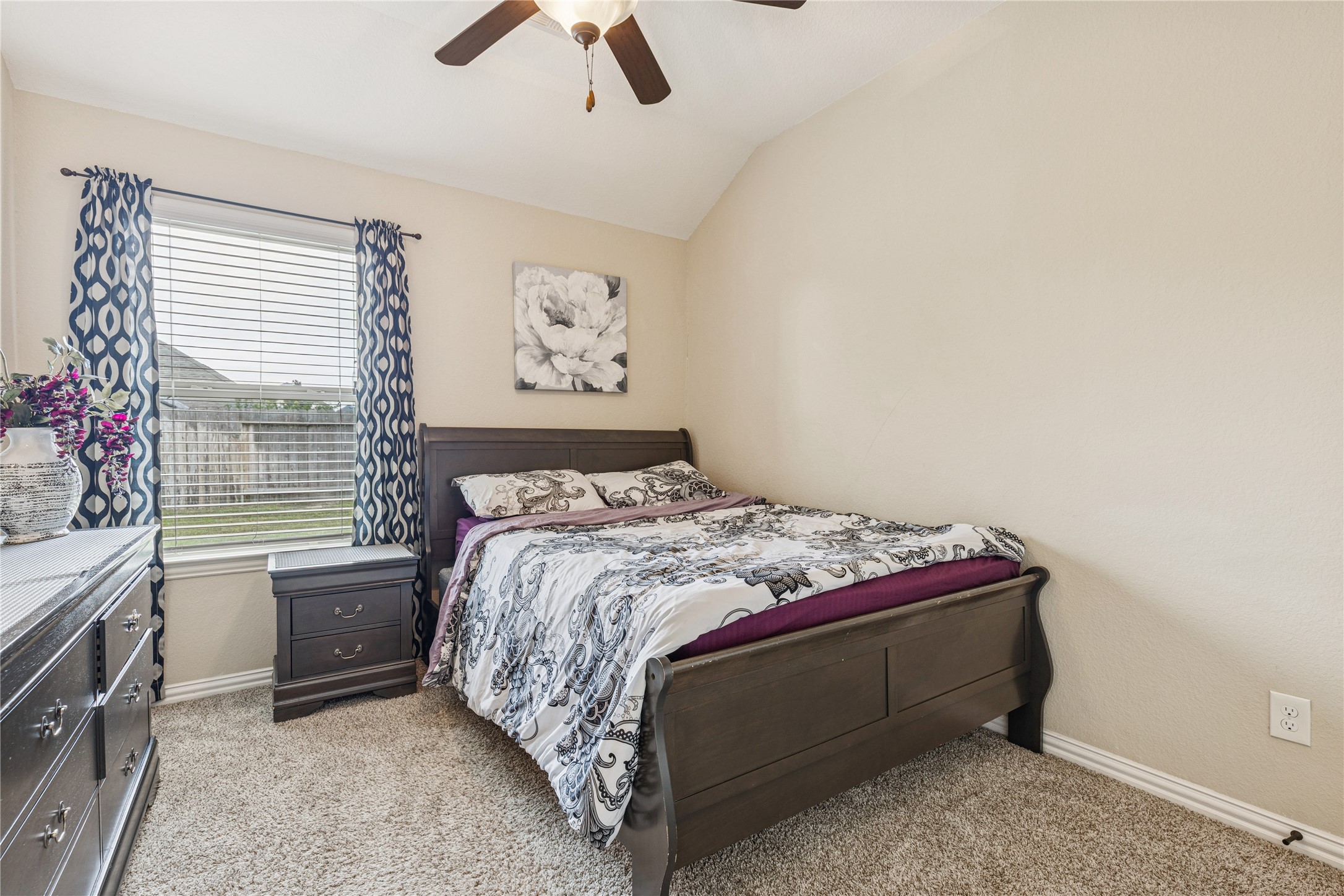 3876 Oakmist Bend Lane Spring, TX 77386 - Photo 31 of 41 a bedroom with a bed and a window