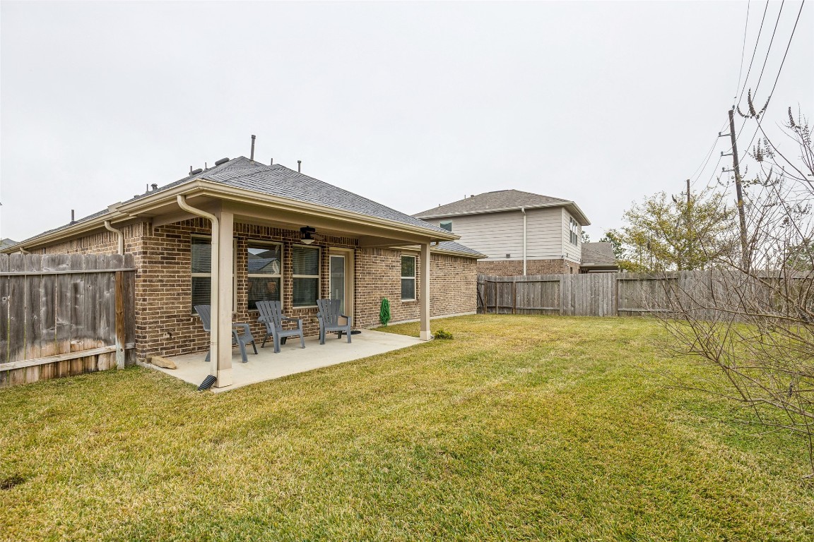 3876 Oakmist Bend Lane Spring, TX 77386 - Photo 38 of 41 a front view of a house with patio