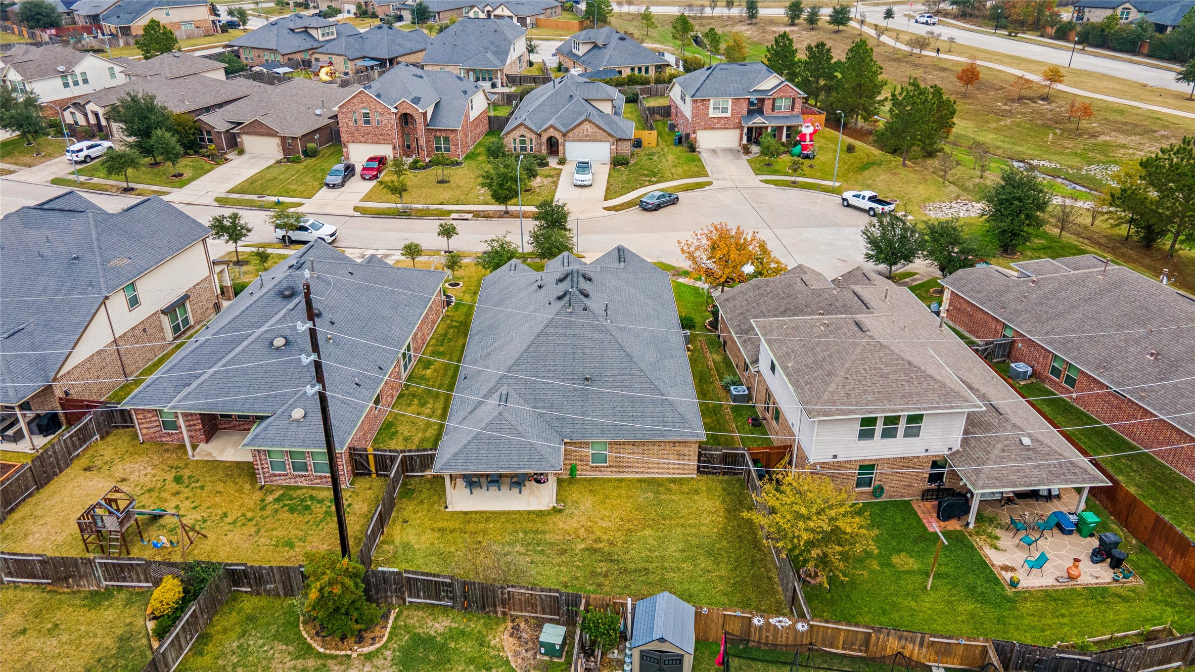 3876 Oakmist Bend Lane Spring, TX 77386 - Photo 40 of 41 an aerial view of residential houses with outdoor space