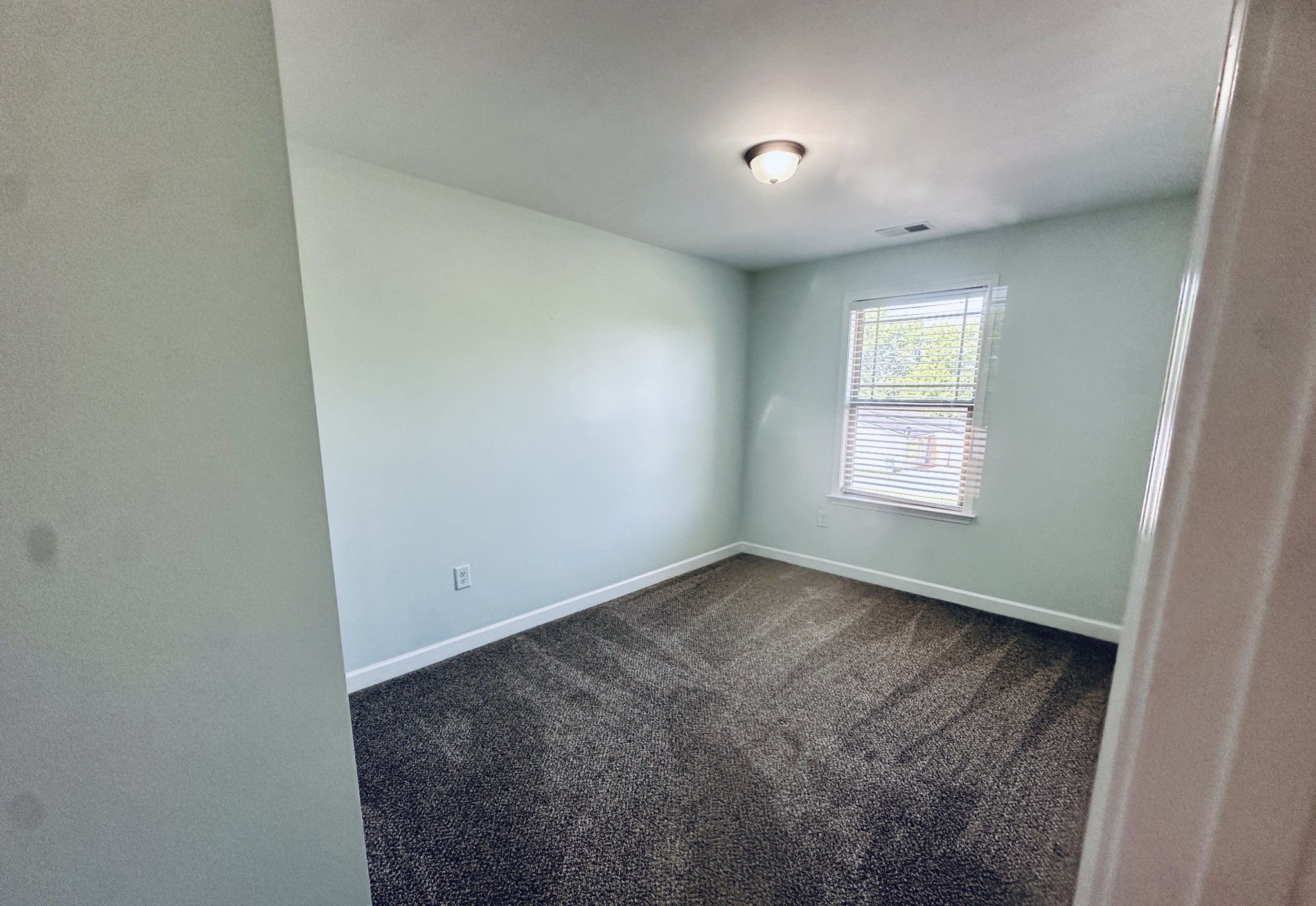 935 Bluebird Road Lebanon, TN 37087 - Photo 10 of 11 an empty room with a window