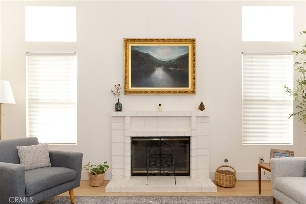 6059 Merion Court Banning, CA 92220 - Photo 13 of 48 a living room with furniture and a fireplace